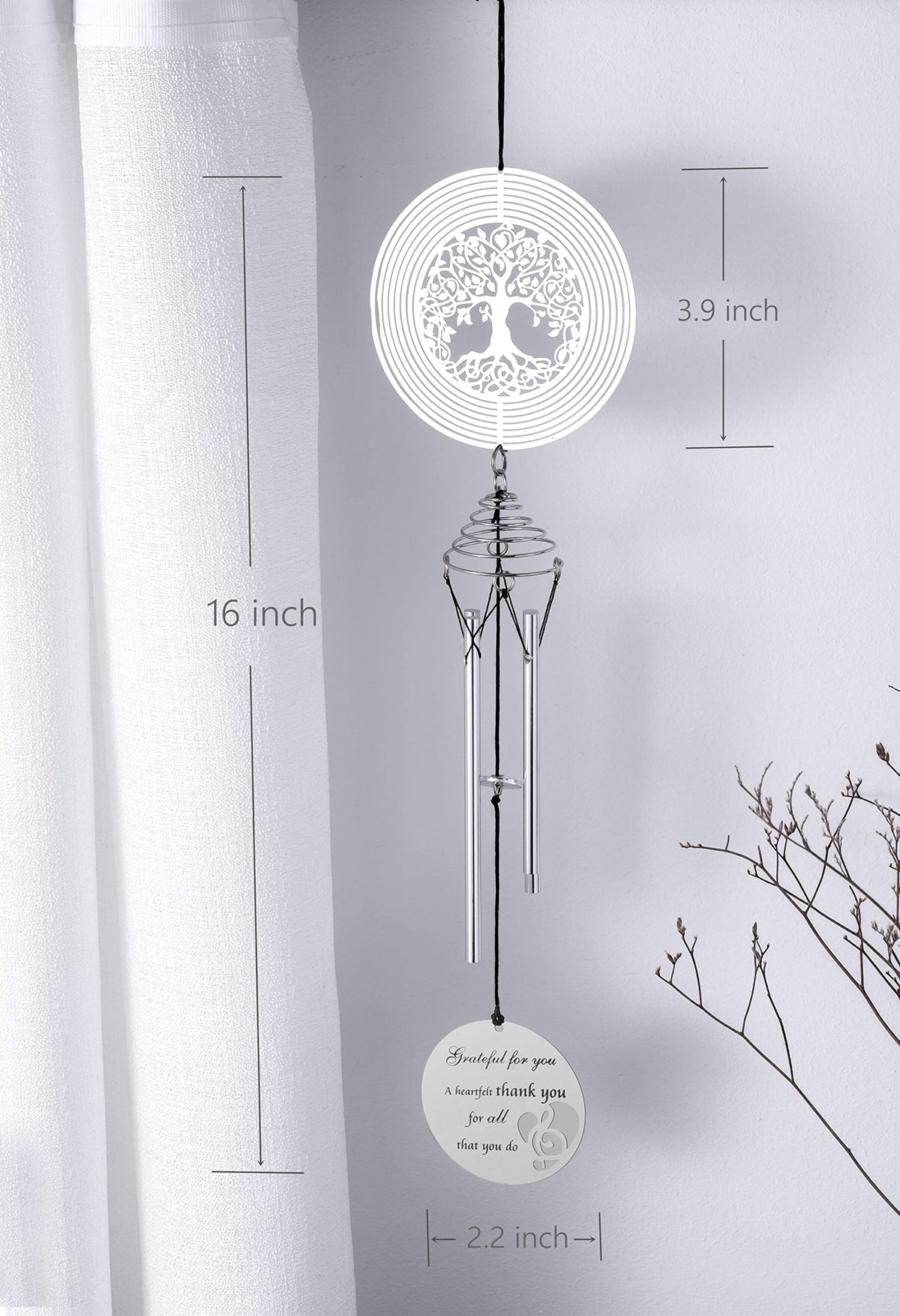 LEAVORES wind chimes shown as outdoor decor in a garden space