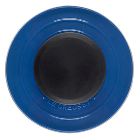 Le Creuset grill pan brush handle detail emphasizes ergonomic grip and durable construction.