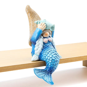 Leekung Mermaid Gnome statue on window sill shines with nautical charm