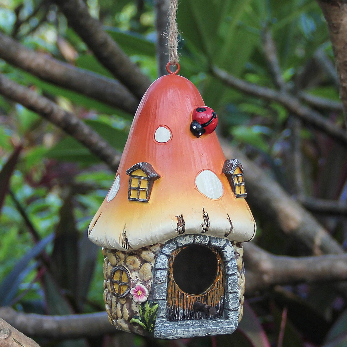 Leekung Mushroom Bird House with orange roof attracts small birds in gardens