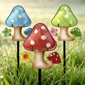 LEGIFO mushroom stakes 3-pack with metal frames and glass caps brighten garden edges.