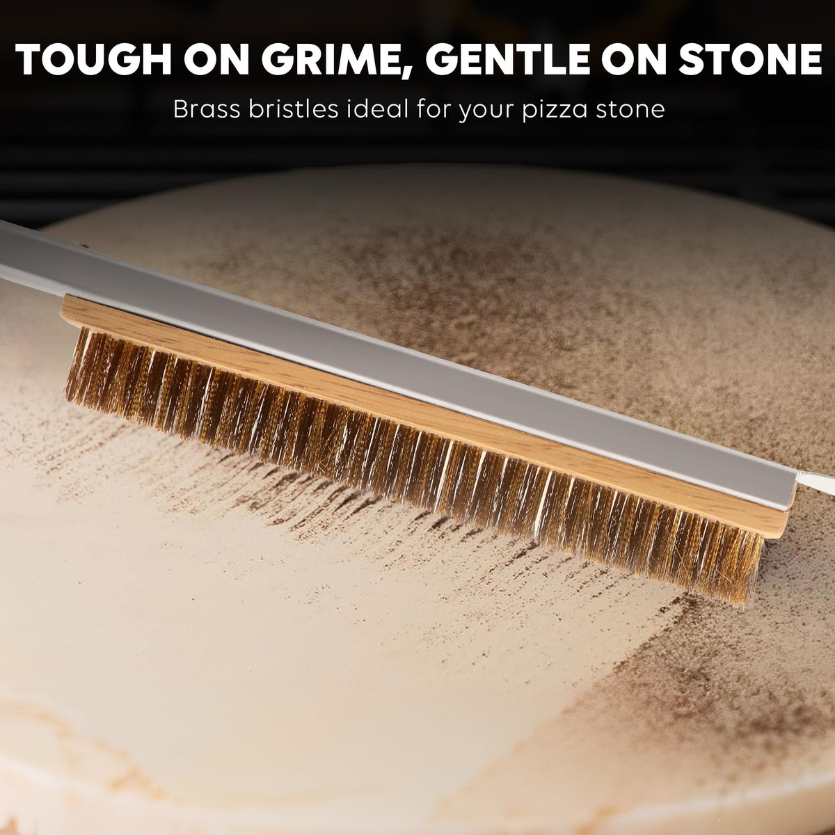 Leightszen pizza brush with stone scraper removing baked-on residue.
