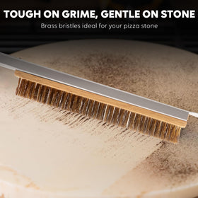 Leightszen pizza brush with stone scraper removing baked-on residue.