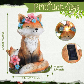 Leinuosen mother fox with cub statue illuminates outdoor patio safely.