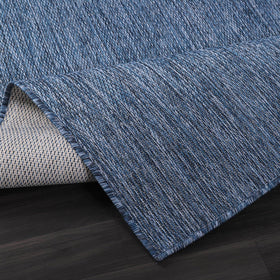 Lena Rug indoor-outdoor living room and kitchen with azure blue rug.