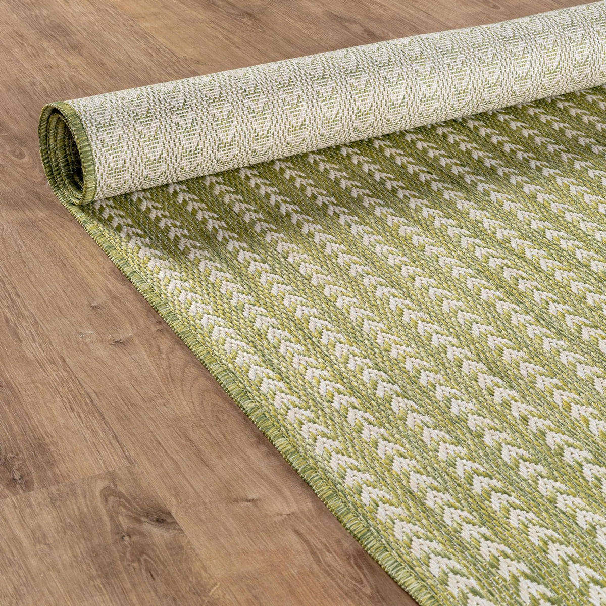 Lena Rug indoor outdoor versatile rug complements living rooms.