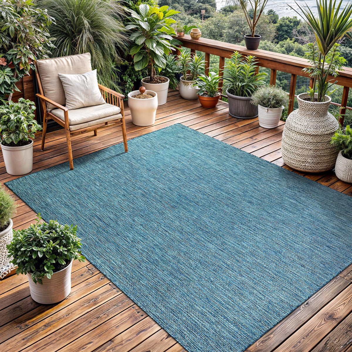 Lena Rug modern solid design complements porches and living areas