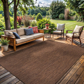 Lena Rug modern solid design blends with outdoor and indoor decor.