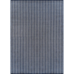 Lena Rug navy striped outdoor rug made of waterproof polypropylene for sun and rain resilience.