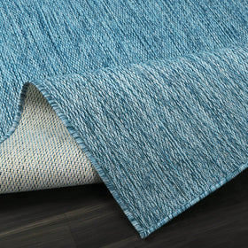 Lena Rug 8x10 on patio or deck for defined outdoor living space