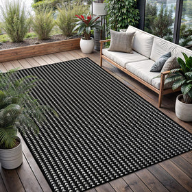 Lena Rug fits under furniture thanks to its low-pile profile.