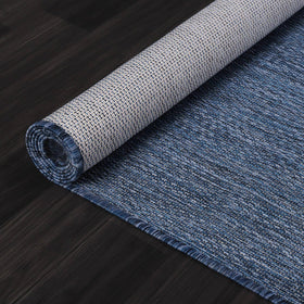 Lena Rug Azure Blue backyard rug helps define spaces with durable, mess-friendly fibers