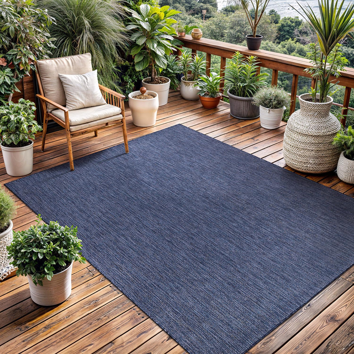 Lena Rug Azure Blue outdoor rug on porch offers easy cleaning and versatility