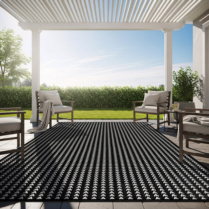 Lena Rug 8x10 striped outdoor rug on patio, easy to clean.
