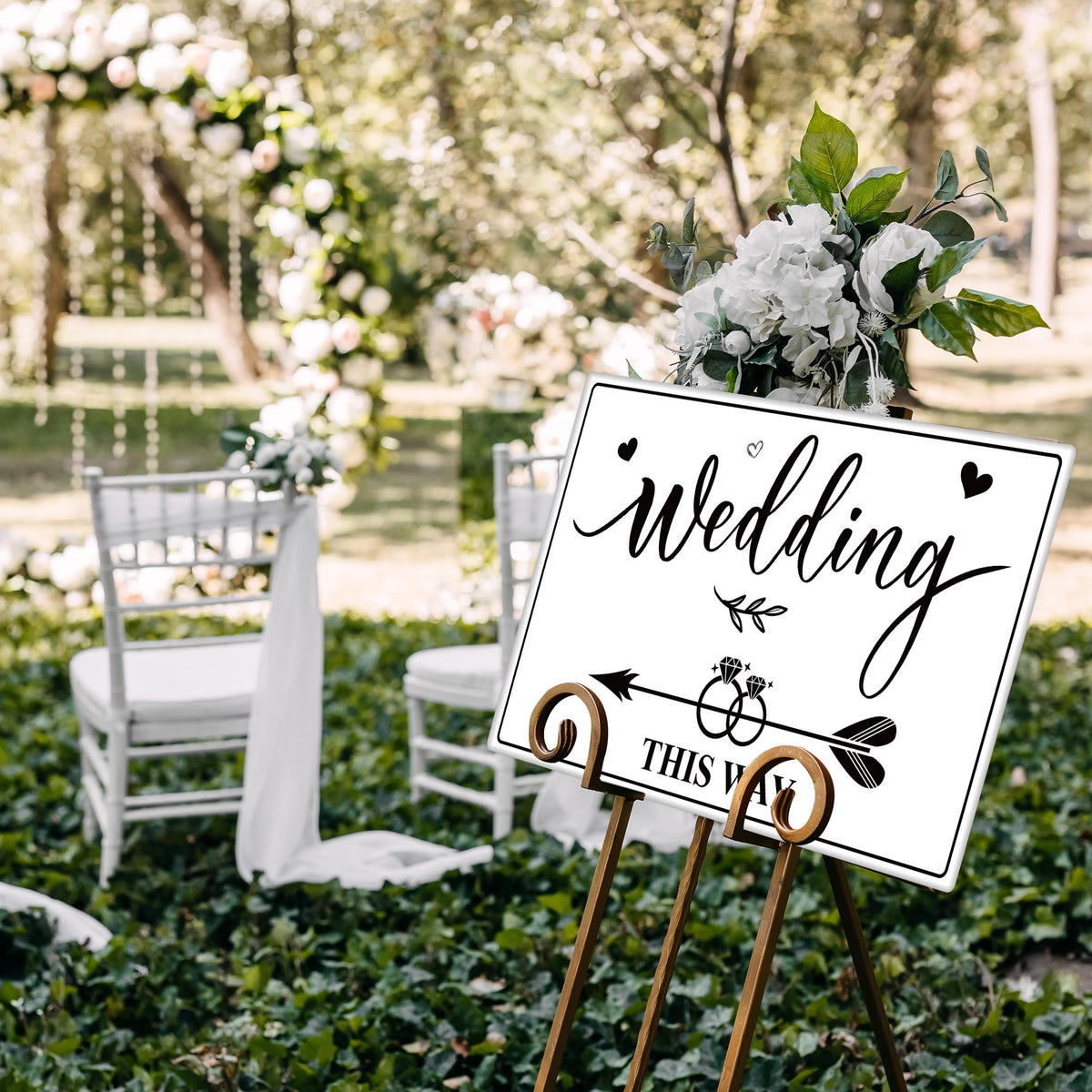 Lesnala wedding arrow leaf ring design guides guests with romance.