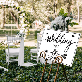 Lesnala wedding arrow leaf ring design guides guests with romance.