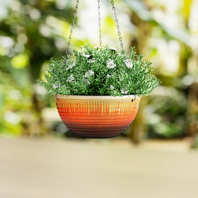 Orange glaze LESOASIS planter enhances porch and living areas