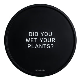 Lettuce Grow water-resistant mat under a large pot protecting floors.