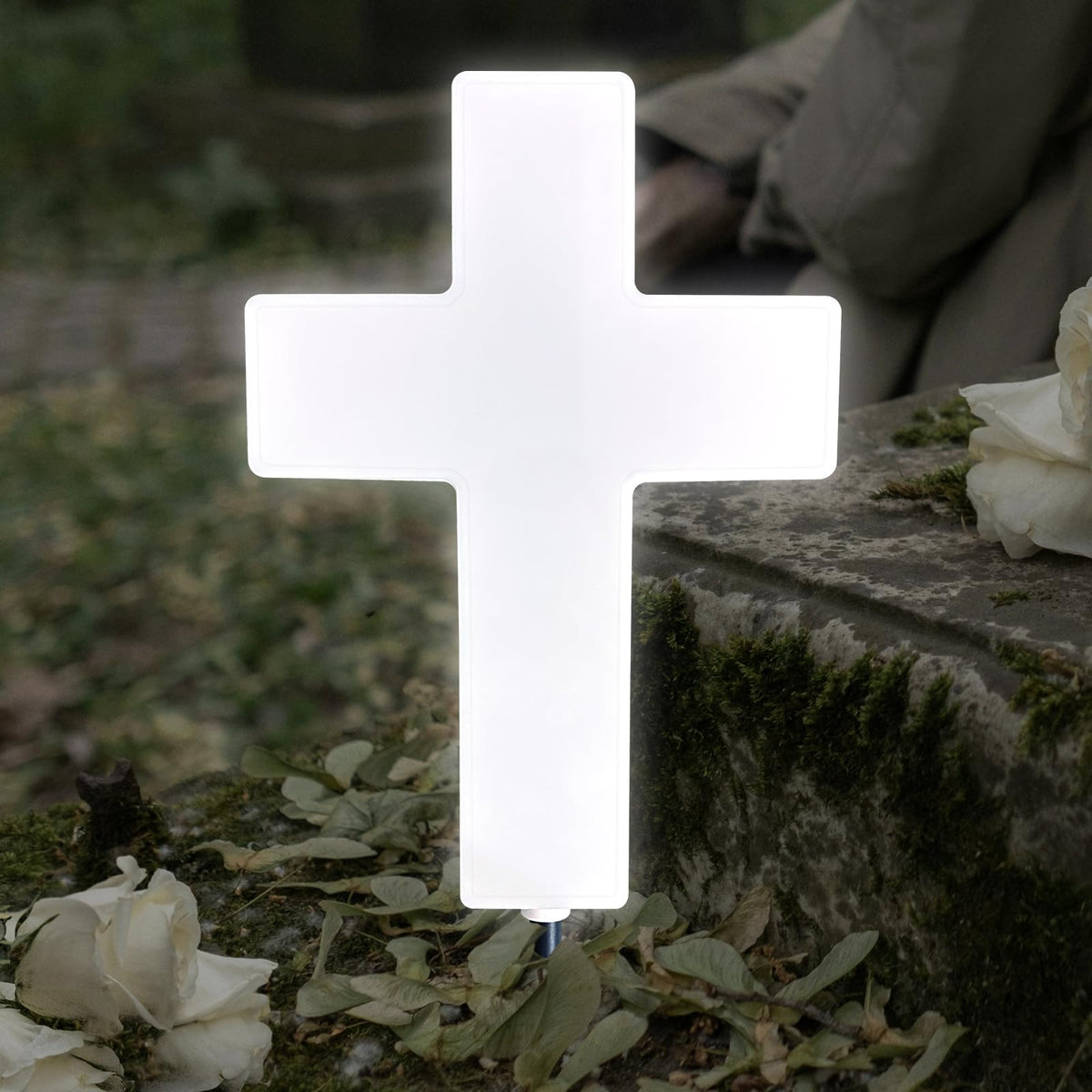 Lifeholic Solar Cross Light white grave design illuminates outdoor remembrance softly.