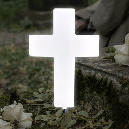Lifeholic Solar Cross Light white grave design illuminates outdoor remembrance softly.