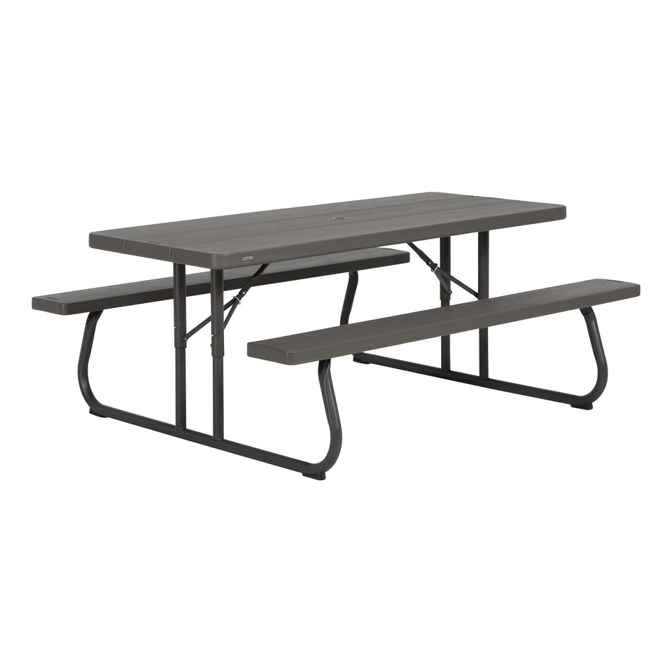 Lifetime 6-foot classic folding picnic table ready for backyard meals with eight-seat capacity.