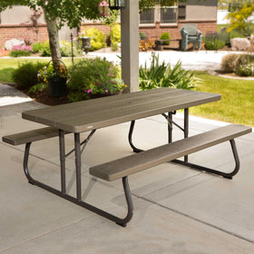 Lifetime 6-foot table folded flat for compact storage after outdoor events.
