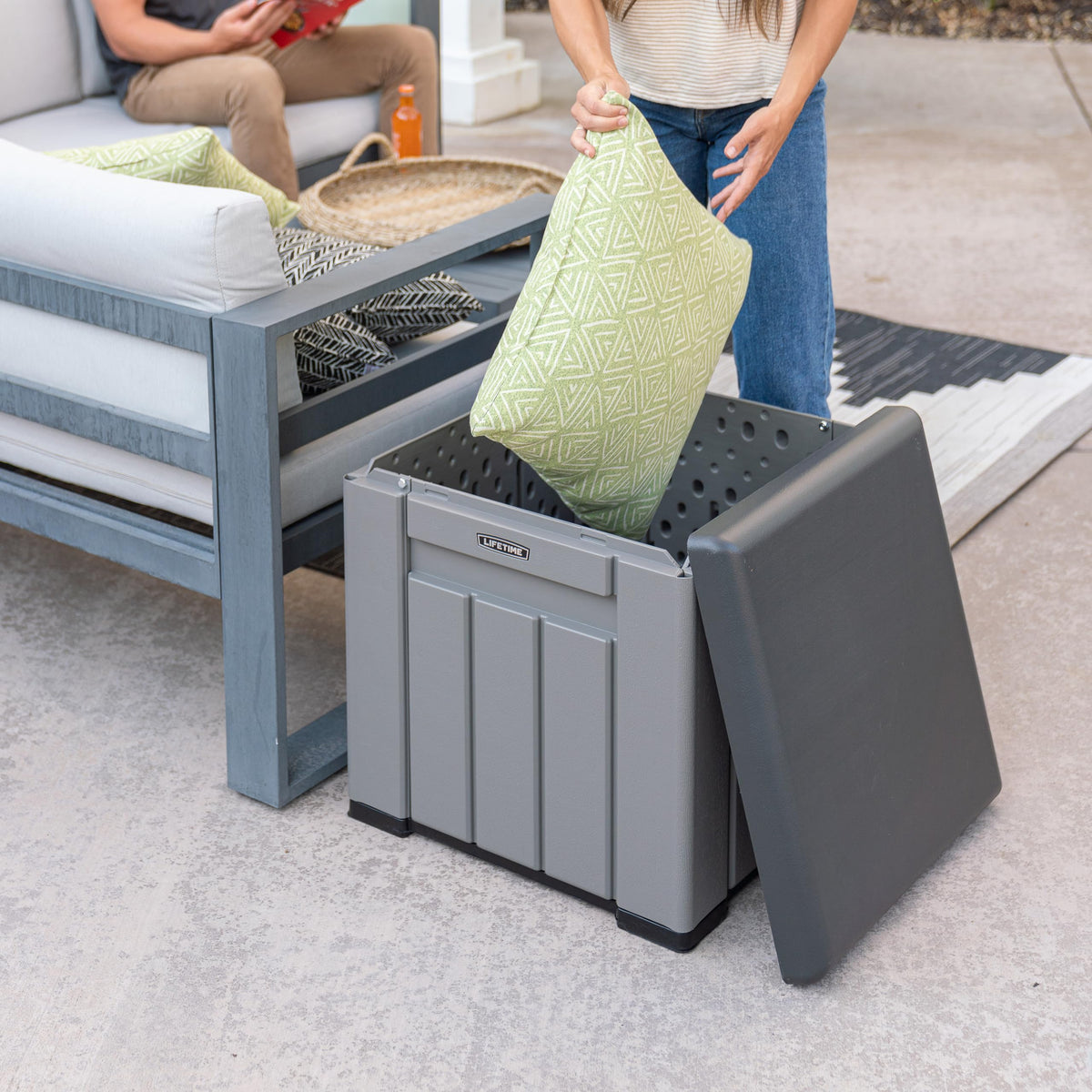 LIFETIME storage cube multipurpose bench and table surface for seating.