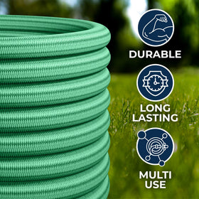 LightHose garden hose stored beside a bed ready for irrigation.