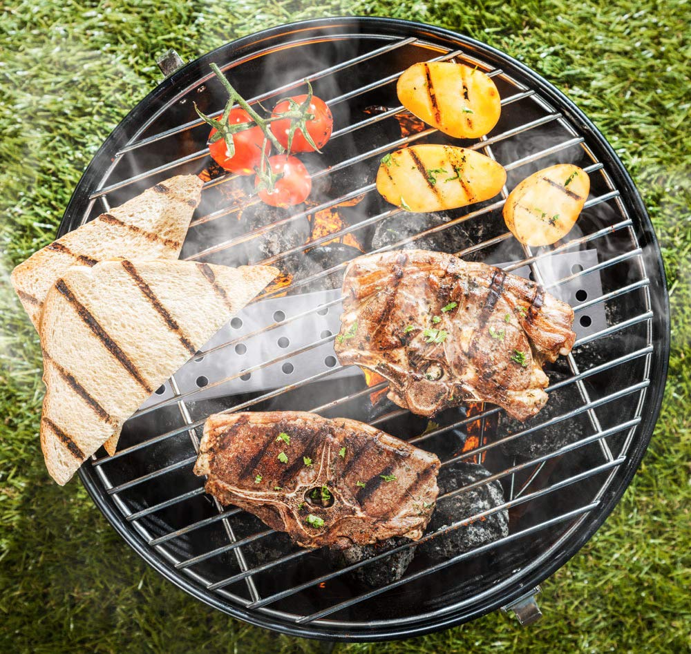 Lightique smoker box on grill during use for smoky flavor
