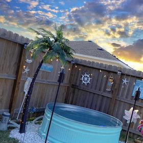 Lightshare 7ft palm tree with 16-foot cord for flexible placement.