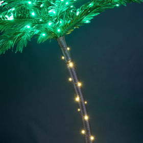 Lightshare palm tree on patio creates tropical decor for gatherings.