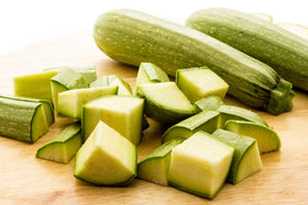 Liliana's Garden Summer Grey Stripe zucchini harvest shows slender skin and mild flavor.