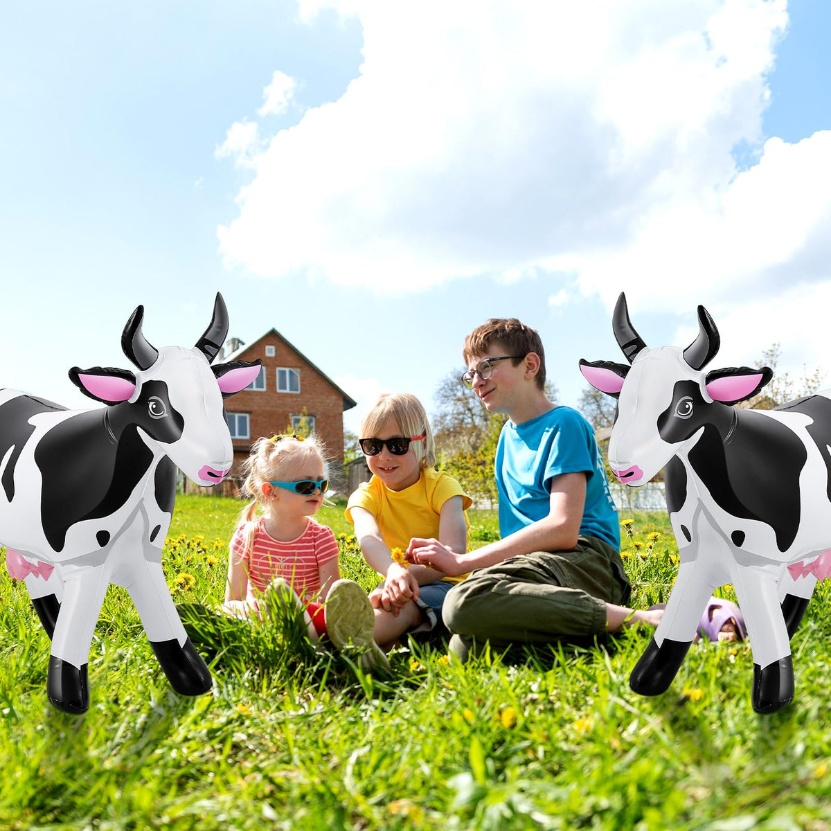 Liliful inflatable cow includes rope and stake to minimize wind drift.