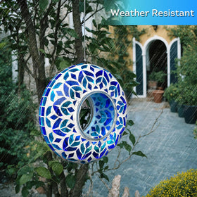 Lily's Home hanging glass feeder mounted on a branch creates a colorful garden focal point.