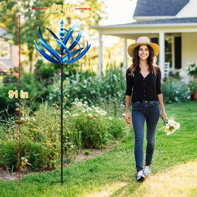 LimeHill wind-spinner in garden adds dynamic visual interest and charm.