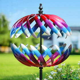 LimeHill wind spinner outdoors at 84 inches turning gracefully in sunlight.