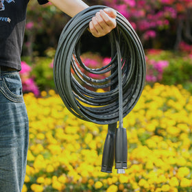 LINEX hose in use for watering beds and RV setups.