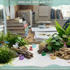 LionWell small duck figures for potted plants and shelves.