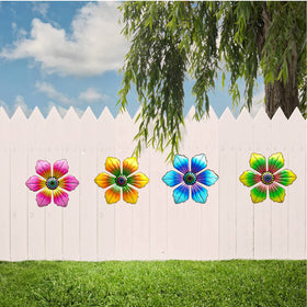 LITIALLY detailed metal flower sculptures provide lasting decorative appeal.