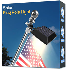Little Joke solar flag light mounted on a 5ft pole providing dusk illumination