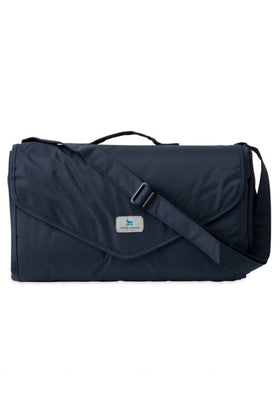 Little Unicorn blanket shows exterior zipper pocket for quick-access essentials