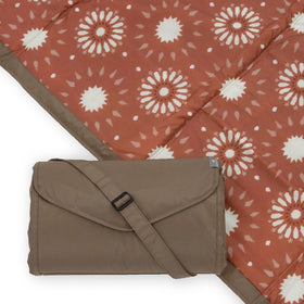 Little Unicorn outdoor picnic blanket on grass provides comfortable seating and quick spill cleanup.