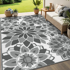 LOKHOM outdoor rug with grey-white floral pattern for patios and decks.