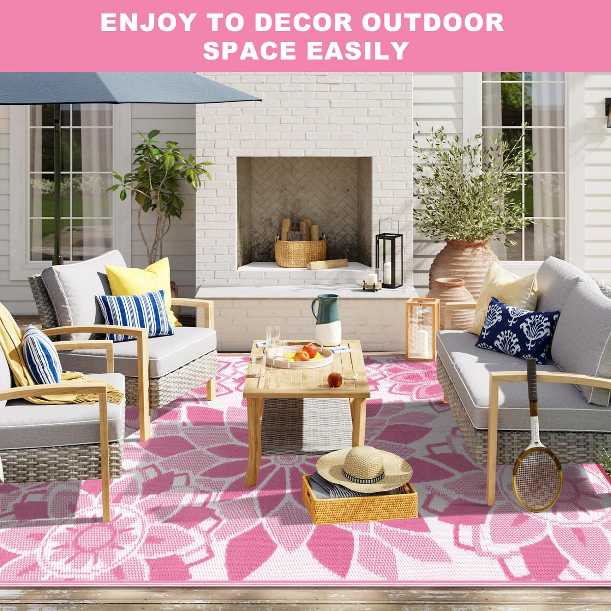 LOKHOM floral pink white rug adding decorative touch to outdoor area