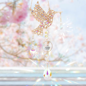 LOKOZ hummingbird sun catcher in gold finish reflecting colors