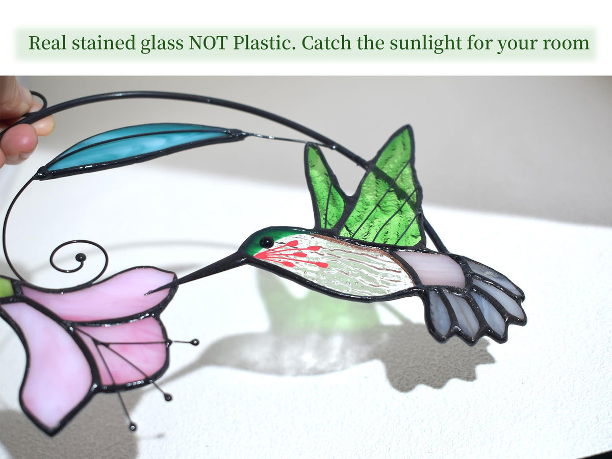 Lolitarcrafts handcrafts stained glass hummingbird on clear sunlit window for warmth