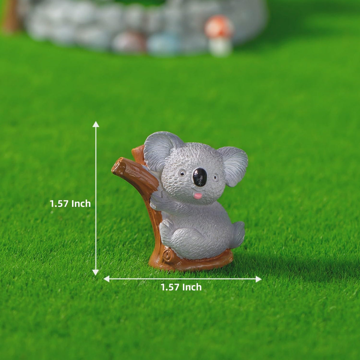 LONCESS koala figurine lying on its side for relaxed garden displays.