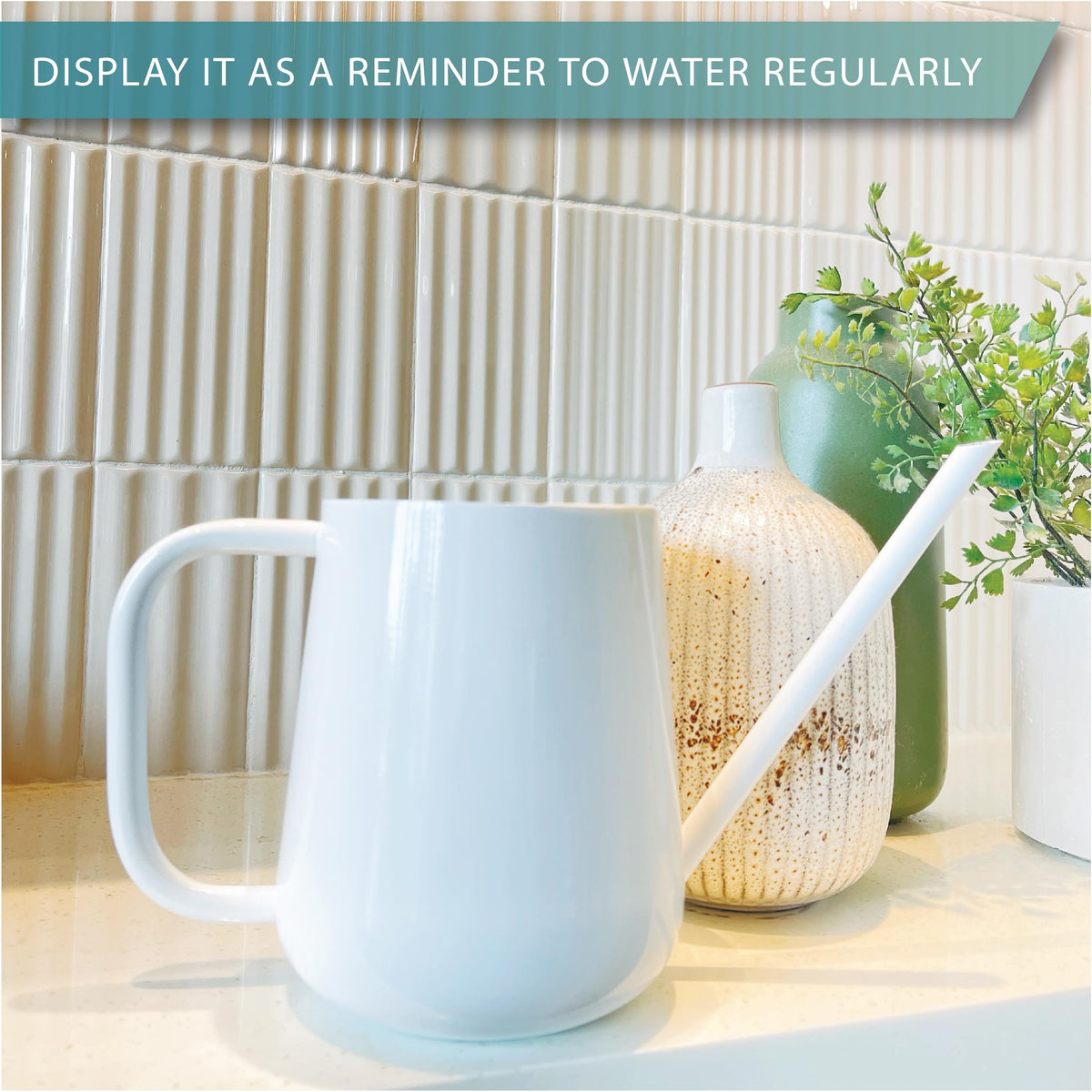 Gooseneck spout on LOOPSEED watering can delivering water with precision.