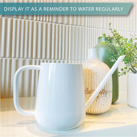 Gooseneck spout on LOOPSEED watering can delivering water with precision.