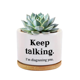 Loovelo Keep Talking ceramic pot on a desk, round design for therapist decor